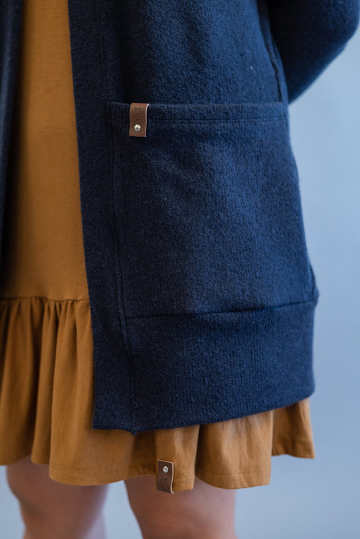 Lightweight Sweater Knits: The Perfect Fabric for Summer-to-Fall Layering