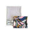 Colorful abstract-patterned swim fabric with a black and white striped coordinating swim fabric including swim notions 