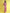 Woman wearing a colorful outfit against a yellow background